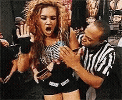 Referee Holding Screaming Woman In Wrestling Match GIF