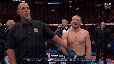 Referee Holding Up Fighter's Arm GIF