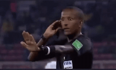 Referee In Black Shirt Saying FIFA On Sleeve GIF