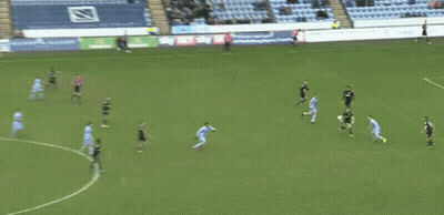 Referee In Purple Shirt With EA On Sleeve GIF