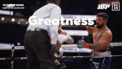 Referee Next To Boxer In Ring GIF