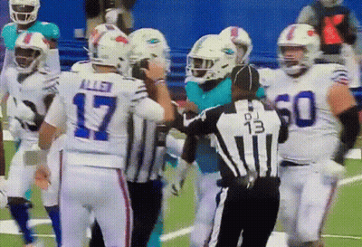 Referee Number 13 Talking To Football Players GIF