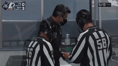Referee Number 58 Talking To Another Referee GIF