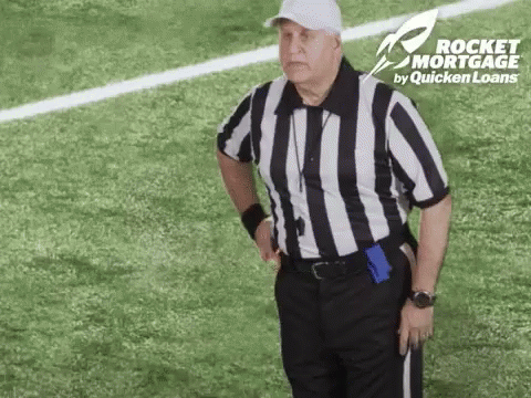 Referee On Football Field With Rocket Mortgage Ad GIF