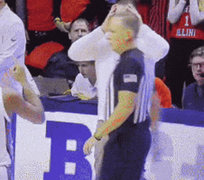 Referee Standing In Front Of Sign Saying B GIF