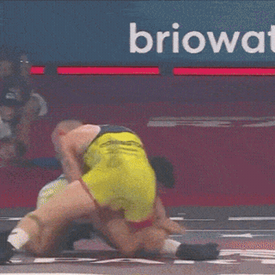 Referee Standing Over Wrestler On Floor GIF