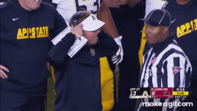 Referee Talking To Coach Wearing AP State Shirt GIF