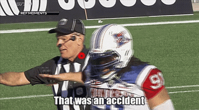 Referee Talking To Football Player In Number 9 Jersey GIF