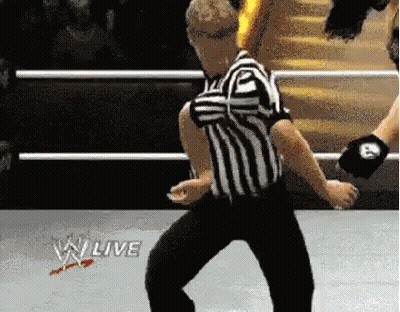 Referee With Fireball From Chest GIF