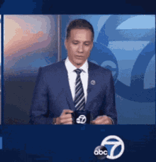 Reggie Aqui ABC7 Mornings Dropping Tea Bag GIF