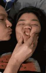 Regular Couple Kisses In Bed GIF