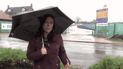 Reporter Girl Funny Rain Splashed Reaction GIF