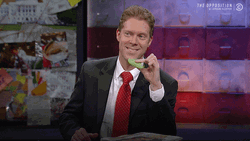 Reporter Playing Fidget Spinner GIF