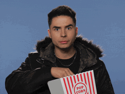 Reykon Popcorn Eating GIF