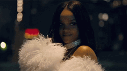 Rhianna Wearing Feathered Coat Flirt Look  GIF