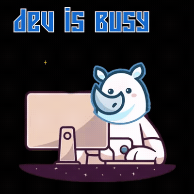 Rhino Sitting at Computer Dev Is Busy