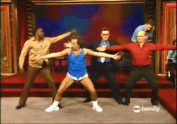 Richard Simmons Wide Open Arms GIF