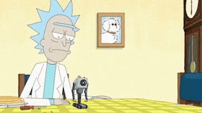 Rick And Morty Are Sitting At A Table With Pancakes On It . GIF