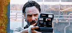 Rick Grimes Using Polaroid Camera