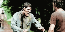 Rick Grimes Walking Dead Pushing Zombie