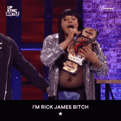 Rick James Holding Mic GIF