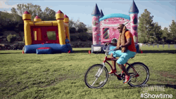 Riding Bike In The Grass GIF