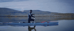 Riding The Canoe In The Plain Water GIF