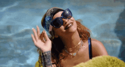 Rihanna In A Pool Waving Hi GIF