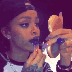 Rihanna Putting On Lipstick