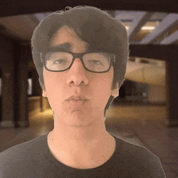 Rizzler Asian Guy Shushing GIF