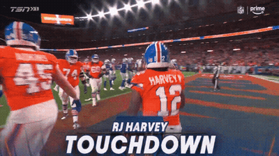 RJ Harvey Football Player On Field With Others GIF