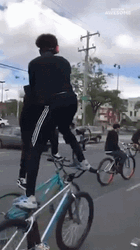 Road Show Bicycle Standing Tricks GIF