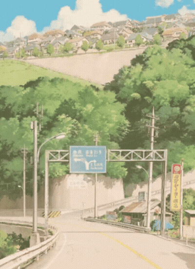 Road Sign Pointing To City GIF