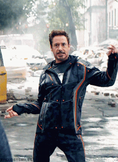 Robert Downey Jr. Is Wearing A Black Jacket And Pants GIF