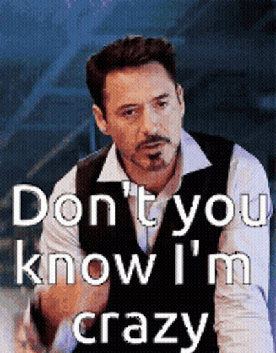 Robert Downey Jr. Says Do N't You Know I 'M Crazy In Front Of A Blue Background GIF