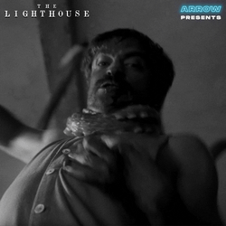 Robert Eggers Punching The Lighthouse GIF