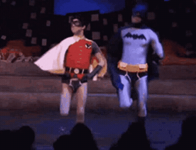 Robin And Batman Walking On Stage GIF