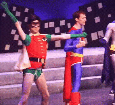 Robin And Superman Dancing On Stage GIF