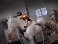 Robin Riding A Horse Sculpture GIF