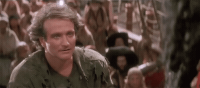 Robin Williams Standing Front of Crowd Looking at Camera