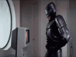 Robocop Destroying TV GIF