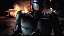 Robocop Walking Away House Fire GIF