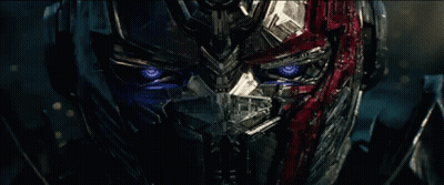 Robot Face Close Up With Blue Eyes GIF