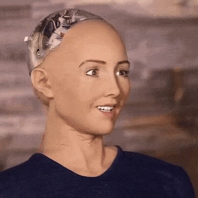 Robot Face Close Up With Blue Shirt GIF