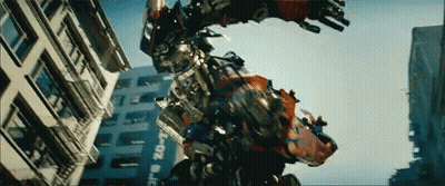 Robot Flying Past Building Saying 20-1 GIF