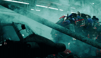 Robot Flying Through Dark Room With Smoke GIF
