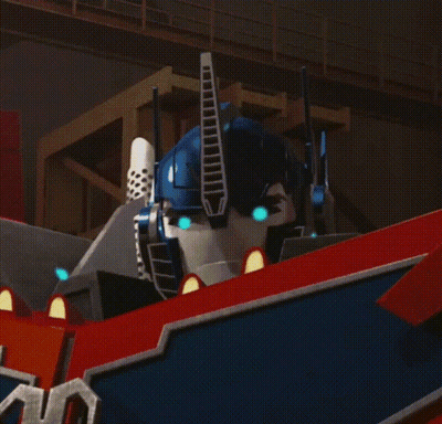 Robot Head Close Up With Blue Eyes GIF