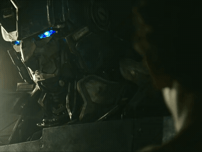 Robot Head With Blue Eyes And Letters CC GIF