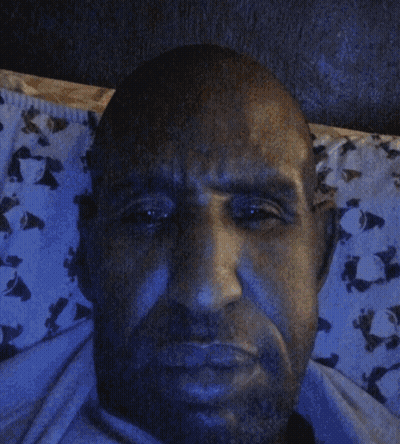 Robot In Blue And Yellow Shirt With WM400 GIF