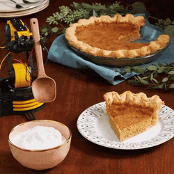 Robot Putting Whipped Cream On Cake GIF